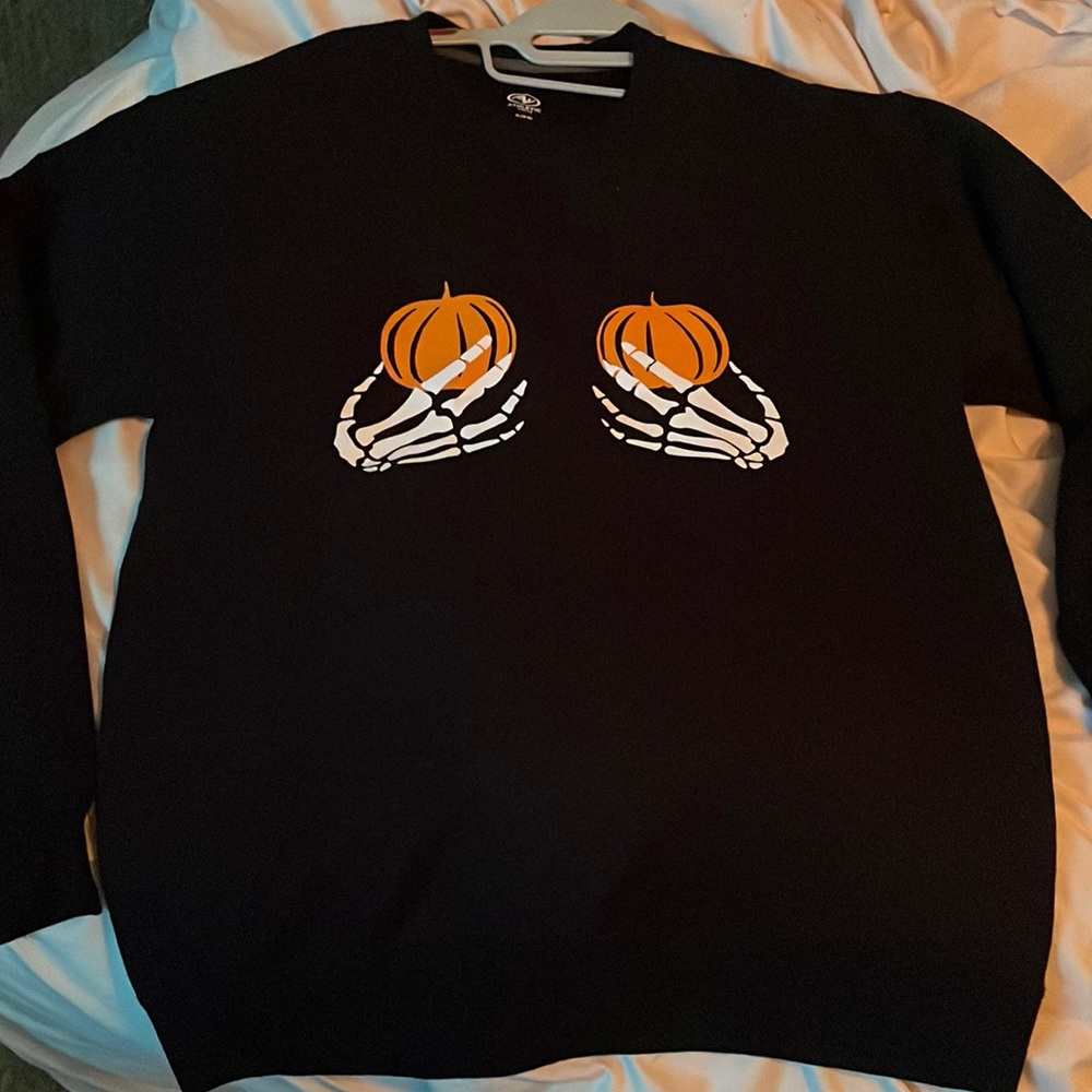 Skeleton Hands holding Pumpkins